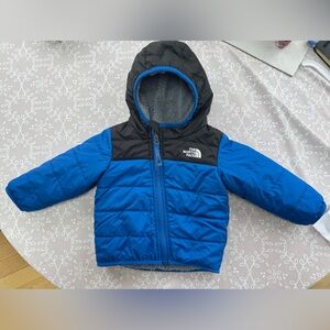 North Face Coat size 12-18 Months. Reversible.